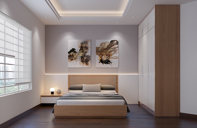 minimalist bedroom with linen bedding and wall sconce lighting