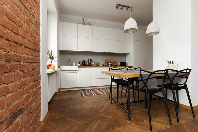 compact apartment layout with foldable table and shelving wall